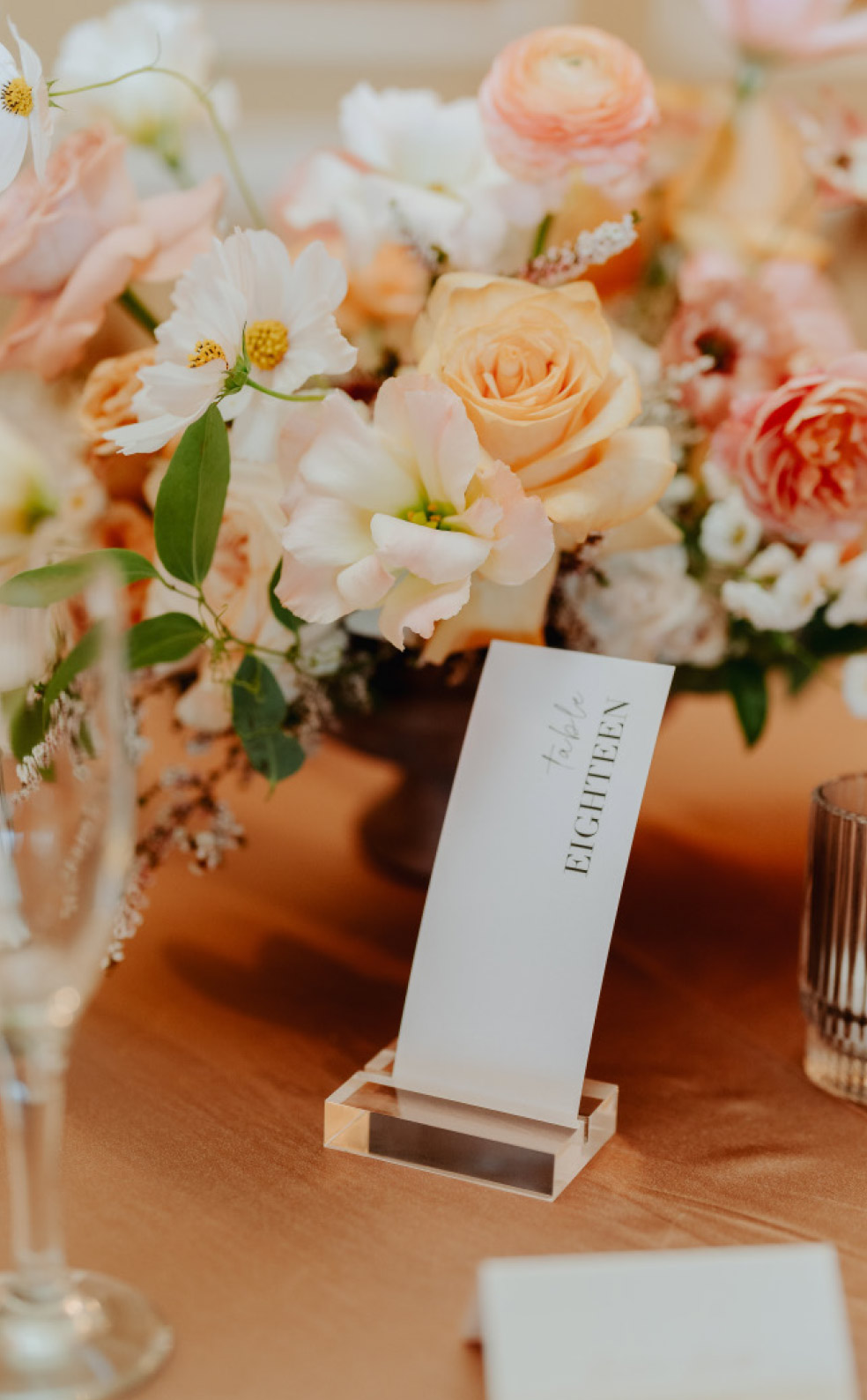 close up of flowers and table number