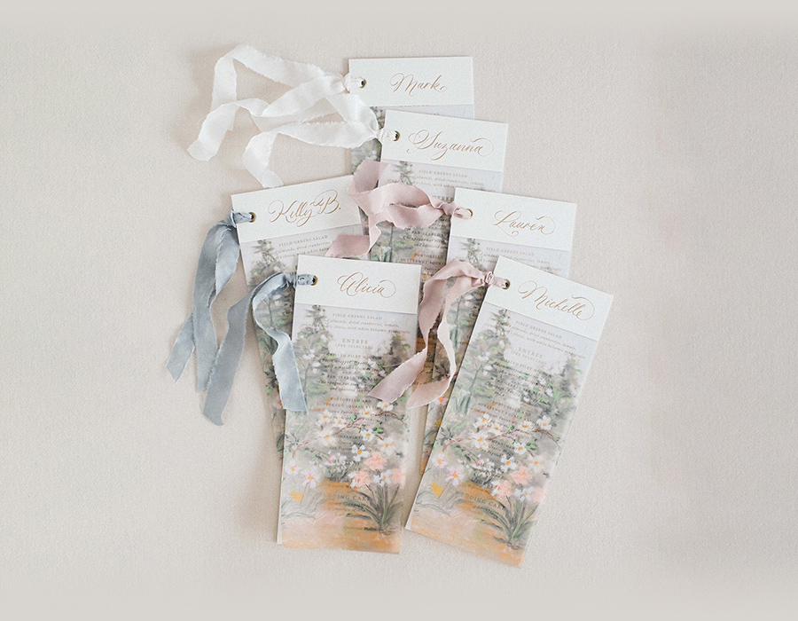 wedding menu cards with bespoke ribbons indicating each entrée