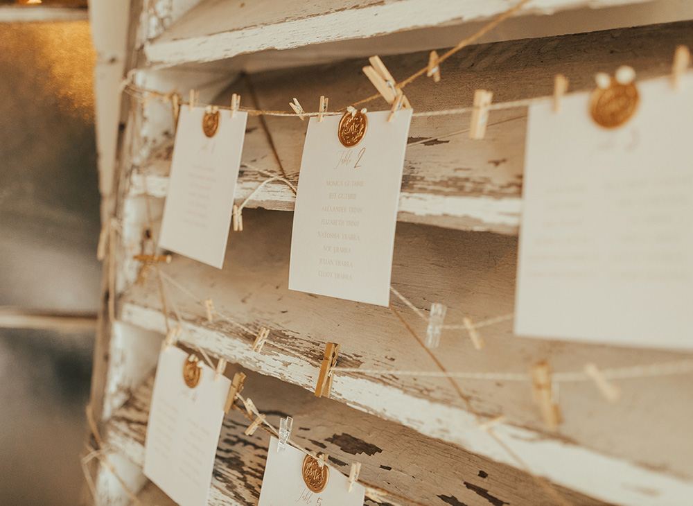 Table assignments hung with pins on a string