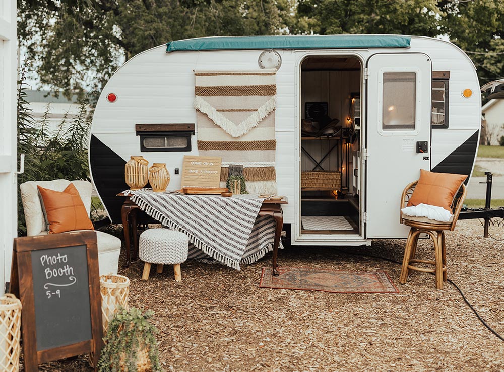 Vintage camper trailer used as a photo booth