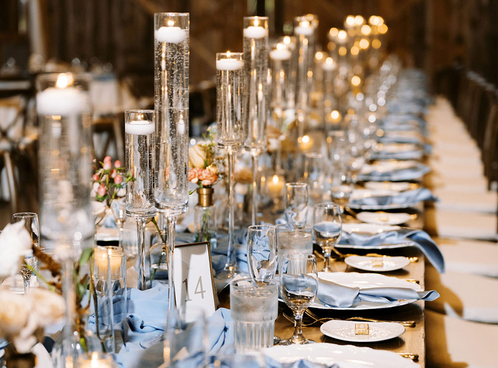 Row of dinner plates and champagne flutes