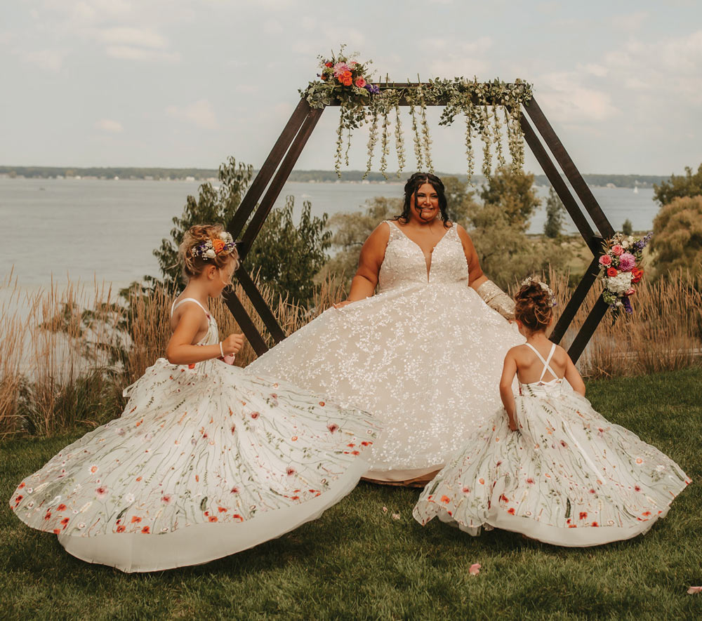 bride with her two daughters in their dresses
