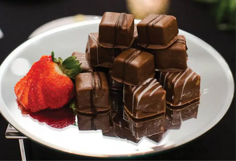 plate of chocolate and strawberry slices