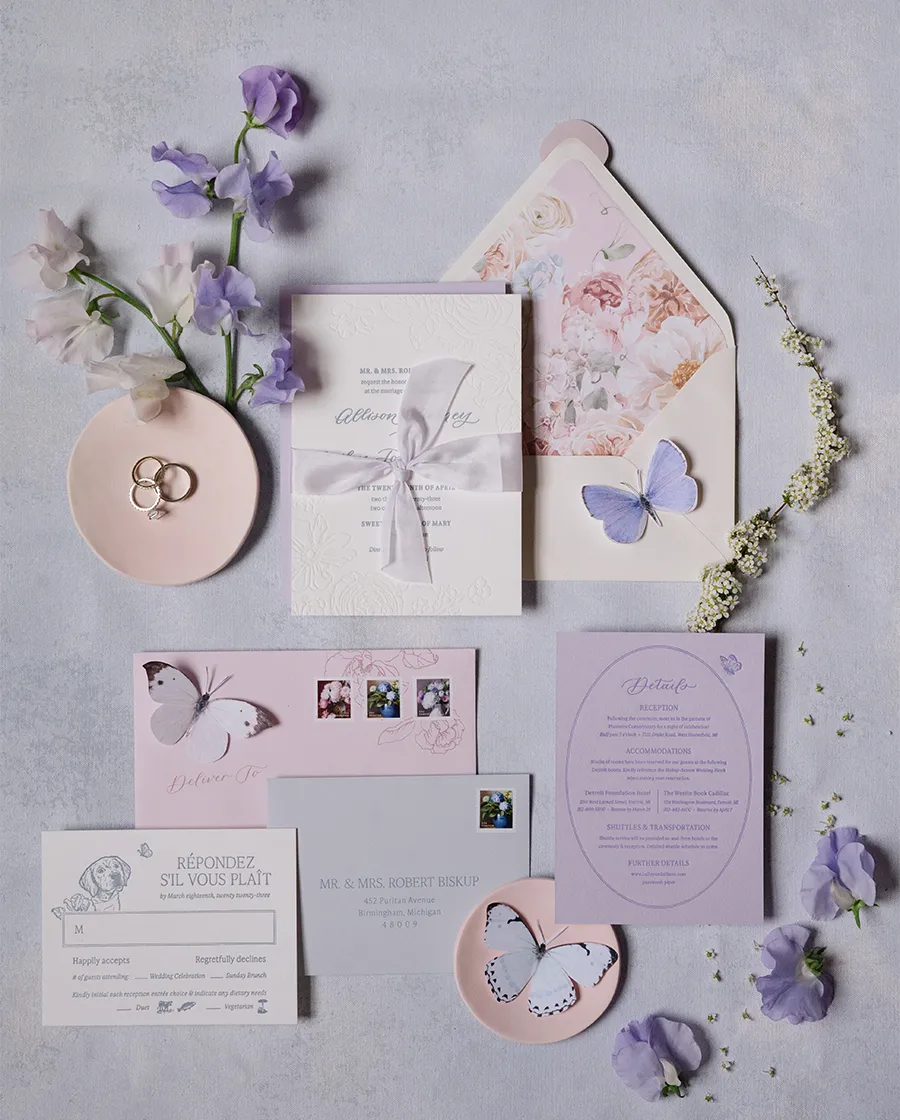 overview of purple stationery from Allison's and Bailey's wedding