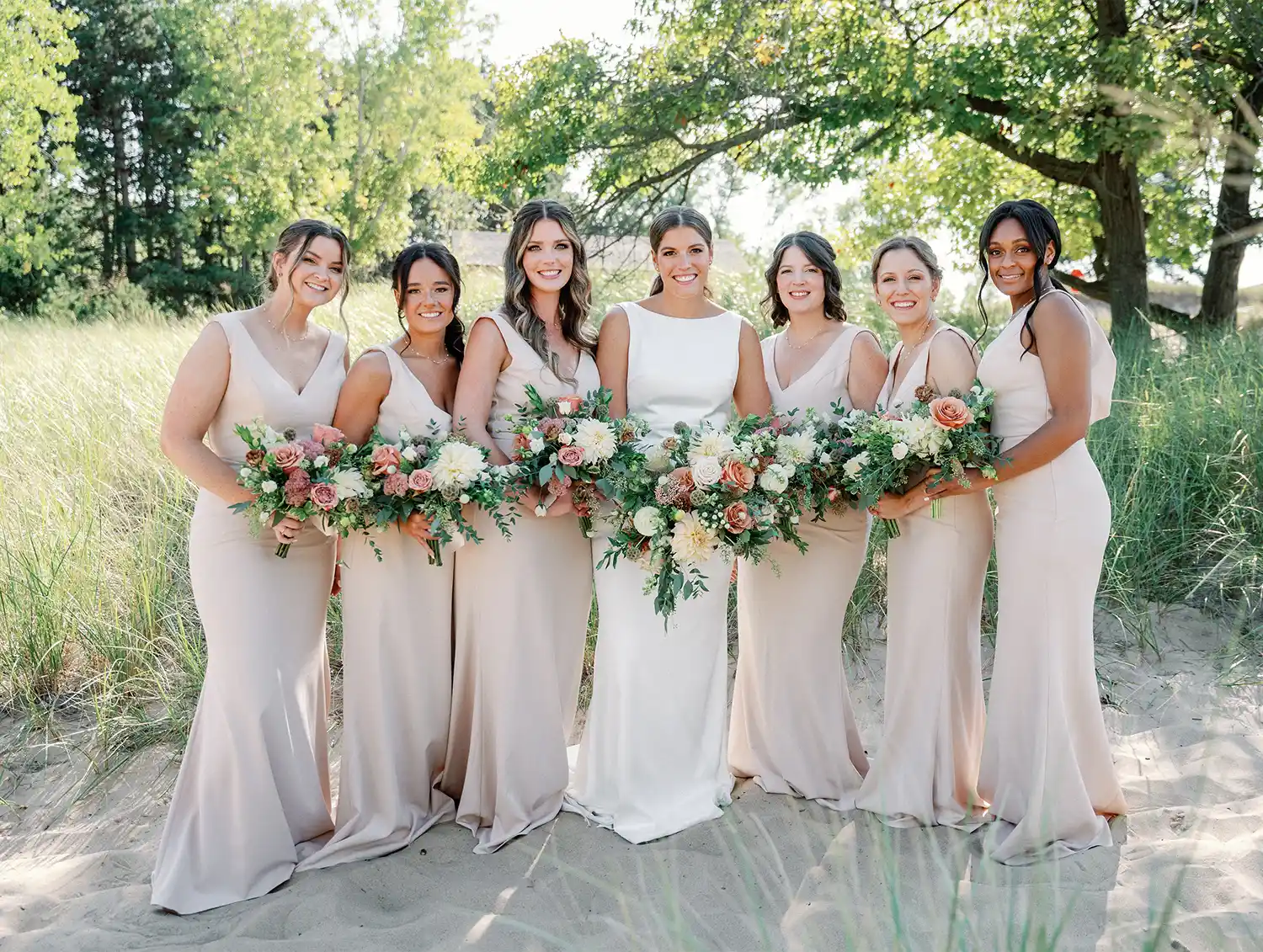 Gabrielle posing with her bridesmaids