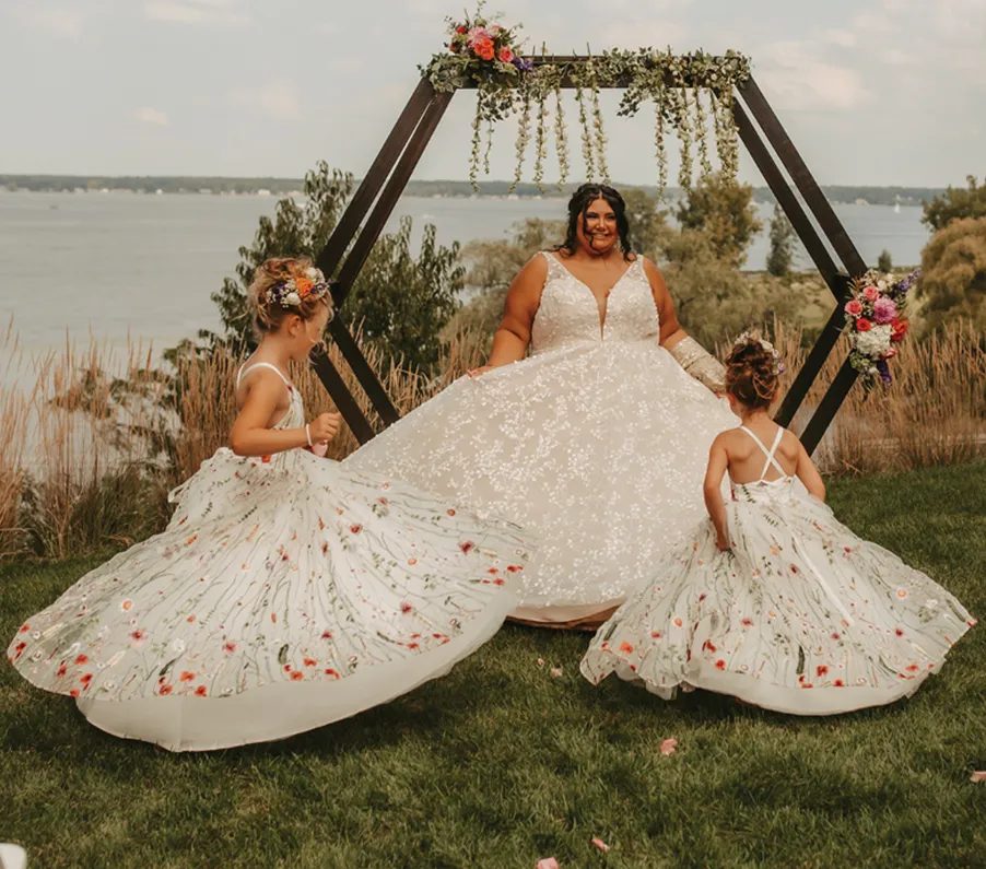 bride and two young bridesmaids