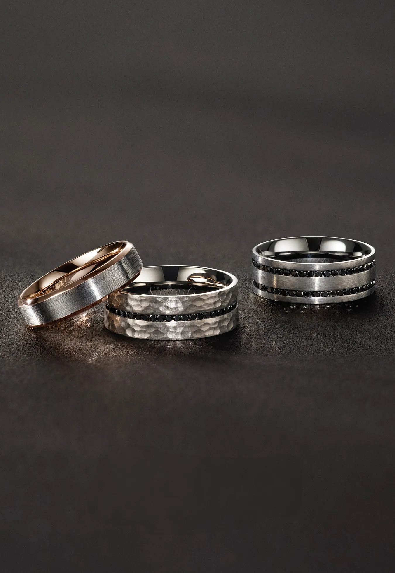 three rings on a black background