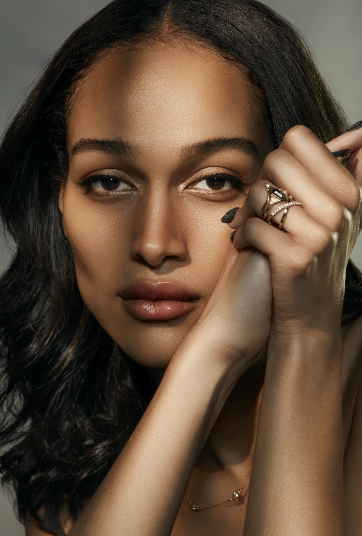 model with both hands near her cheek while wearing Sofia Zakia Moon Guardian Ring, Rosecut Diamond Paeonia Ring, and Diamond Demeter Ring