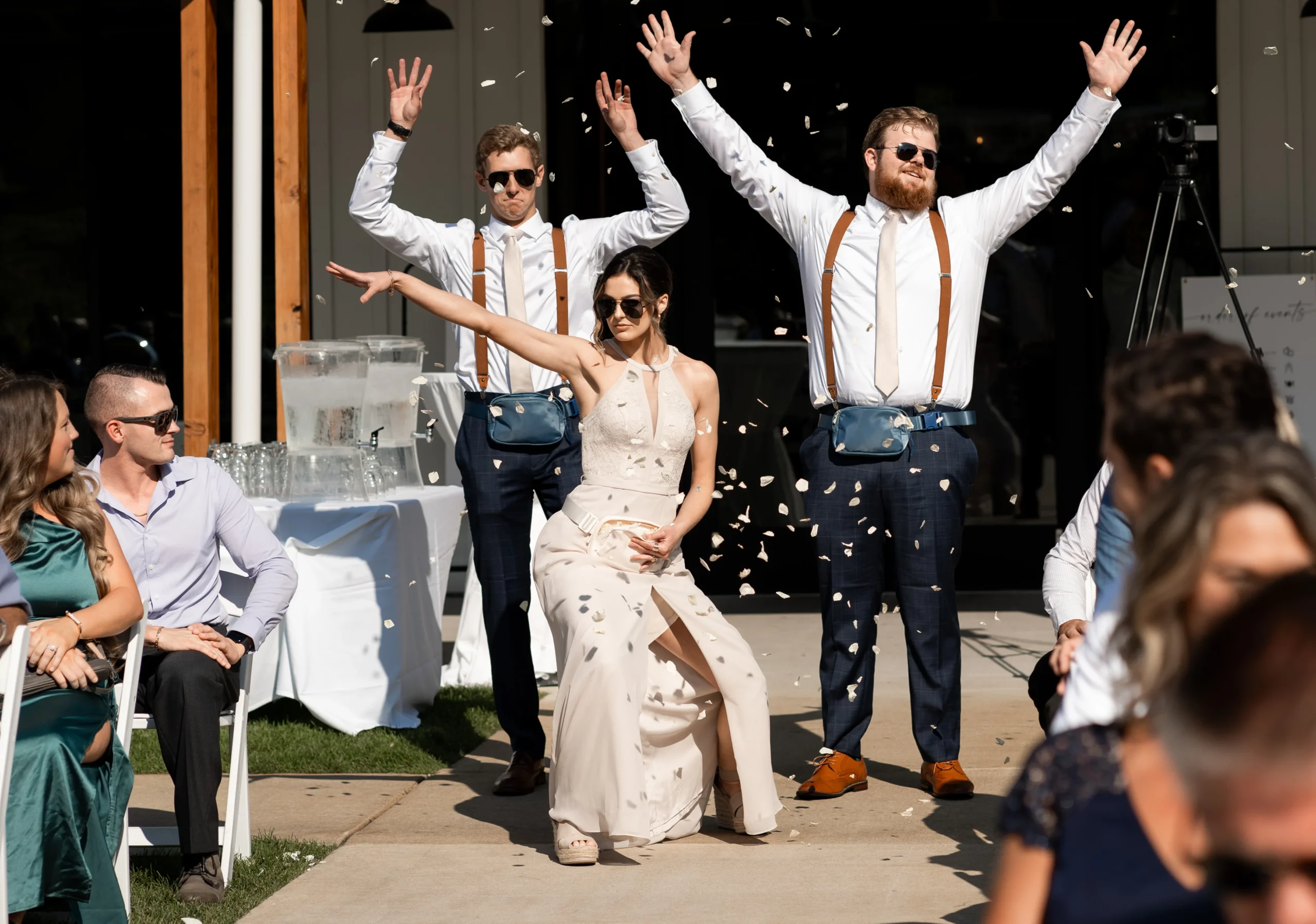 groomsmen and bridesmaid making entrance to the aisle