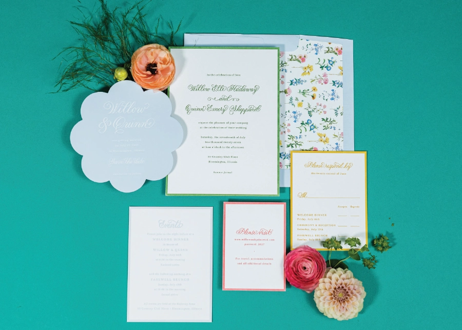 invitations with colorful borders on teal background
